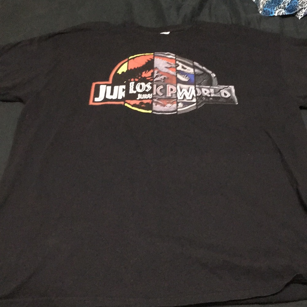 Lightly used Mixed Jurassic park movie logo Shirt